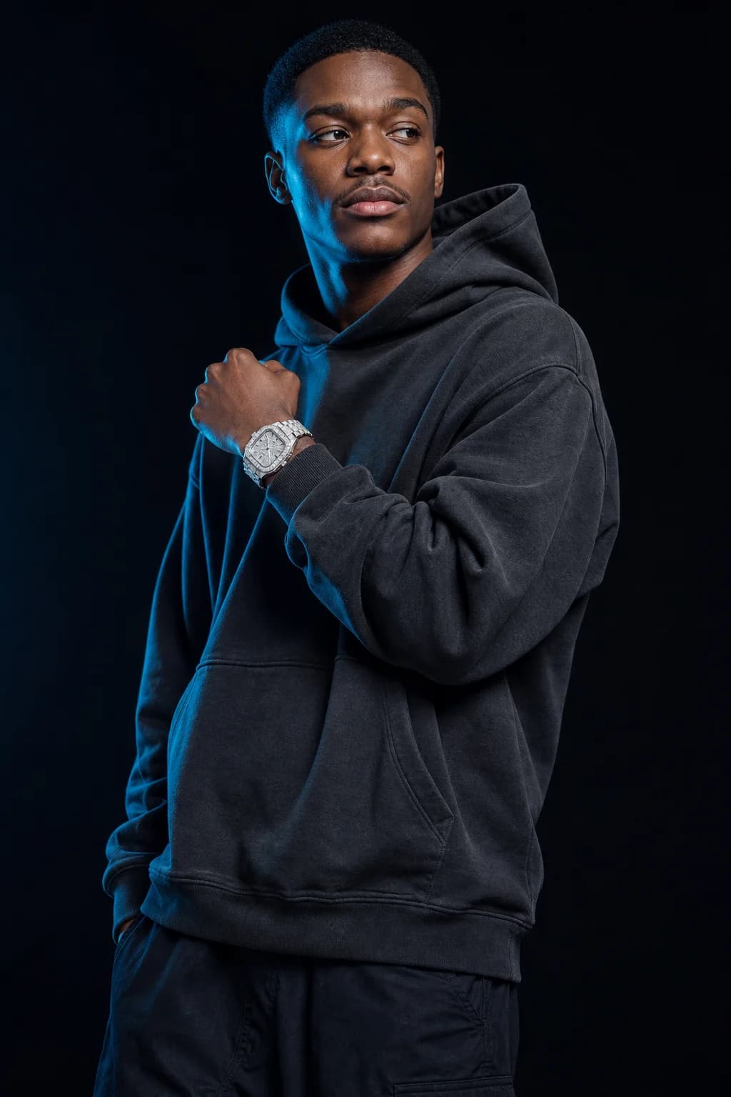 Stone-set watch worn on the wrist, studio portrait